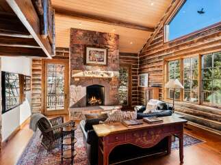 Step into rustic luxury with this stunning cabin retreat.