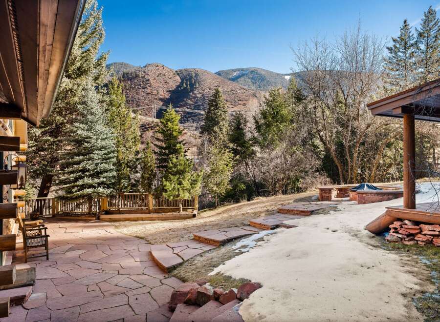Experience the tranquility of this stunning property with its inviting outdoor spaces.