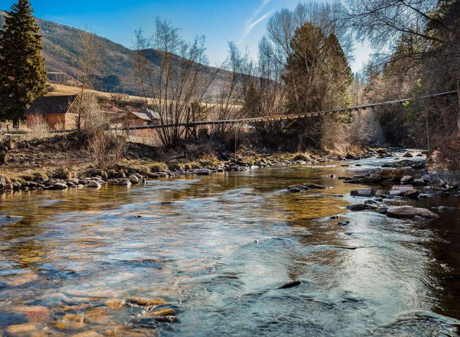 Nestled in a serene natural setting, this property offers a unique blend of tranquility and convenience.