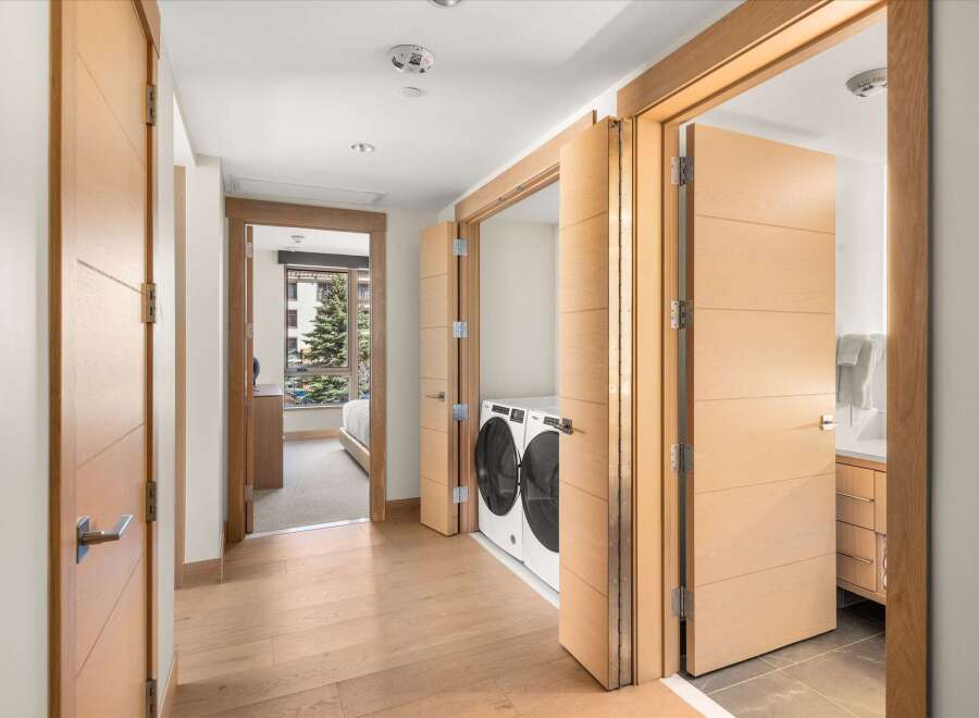 Step into luxury with this stunning property featuring exquisite wooden doors and a modern design.