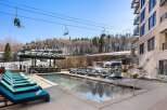 Enjoy luxury living with this stunning property featuring a beautiful outdoor pool and a relaxing hot tub.