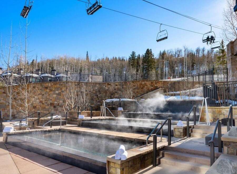 Experience ultimate relaxation at this luxurious property featuring multiple outdoor hot tubs.