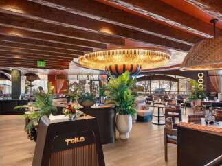 Step into the inviting ambiance of this stunning restaurant, showcasing a blend of modern design and natural elements.