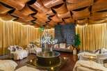 Step into luxury with this stunning property featuring a unique, artistic ceiling design.