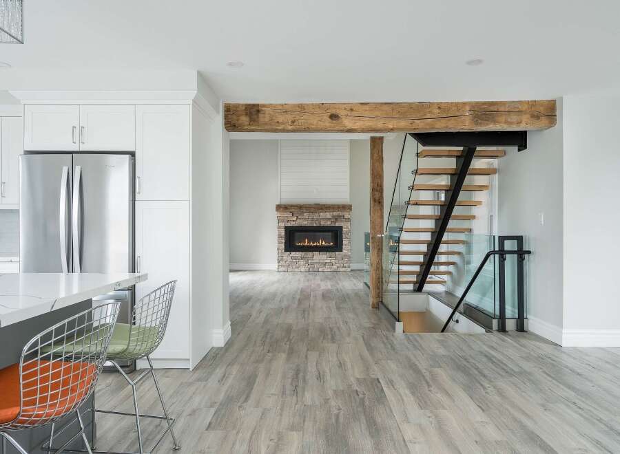 Step into modern elegance with this stunning property, featuring a spacious open-concept design.