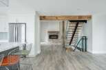 Step into modern elegance with this stunning property, featuring a spacious open-concept design.