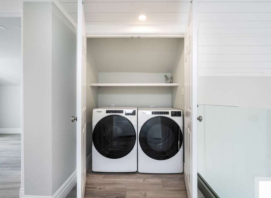 Discover the convenience of in-unit laundry with this stunning property! This home features a dedicated laundry area with modern appliances, making chores a breeze.