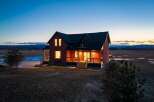 This stunning brick home offers a perfect blend of rustic charm and modern comfort.