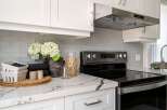 This stunning kitchen boasts modern design and functionality.
