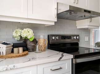 This stunning kitchen boasts modern design and functionality.