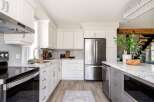 This stunning kitchen boasts modern design and functionality.