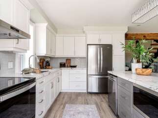 This stunning kitchen boasts modern design and functionality.