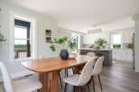 Step into this stunning dining area, perfect for hosting gatherings and creating lasting memories.