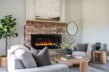 This stunning living room features a cozy fireplace, perfect for those chilly evenings.
