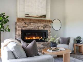 This stunning living room features a cozy fireplace, perfect for those chilly evenings.