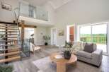 Step into luxury with this stunning property, featuring a modern open-concept design.