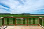Enjoy breathtaking views from this stunning property! This home features a spacious deck, perfect for relaxing and entertaining.
