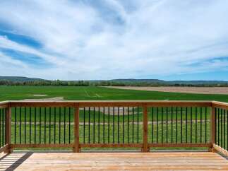 Enjoy breathtaking views from this stunning property! This home features a spacious deck, perfect for relaxing and entertaining.