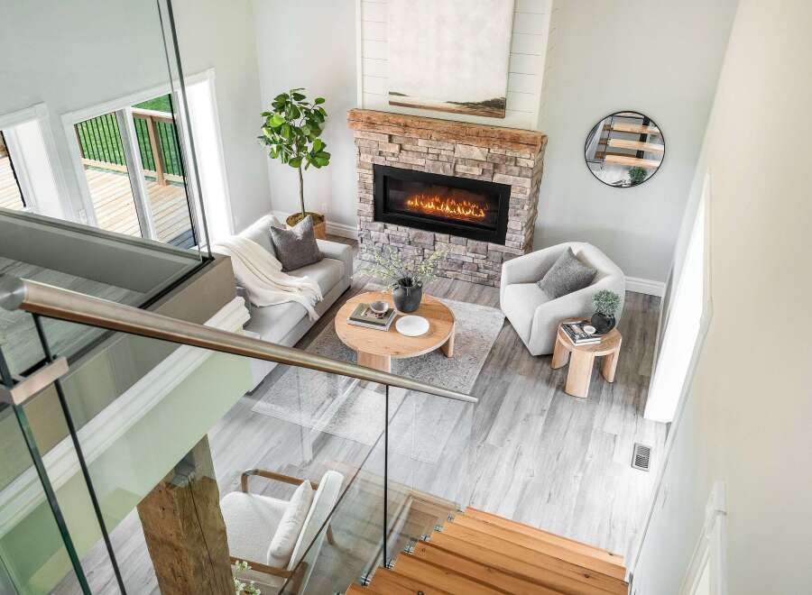 Step into luxury with this stunning property featuring a cozy fireplace, perfect for those chilly evenings.