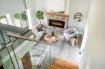 Step into luxury with this stunning property featuring a cozy fireplace, perfect for those chilly evenings.