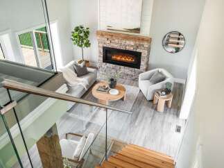 Step into luxury with this stunning property featuring a cozy fireplace, perfect for those chilly evenings.