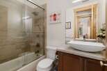 This stunning bathroom boasts a modern design with luxurious features.