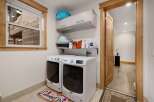 Step into this beautifully designed laundry room, a perfect blend of functionality and style.