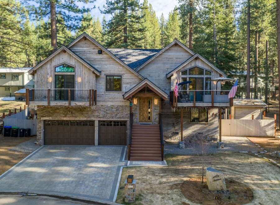 This stunning property boasts a rustic yet modern design, perfect for those seeking a mountain retreat.