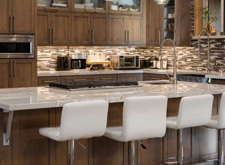 This stunning kitchen boasts a modern design with high-end finishes.