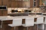 This stunning kitchen boasts a modern design with high-end finishes.