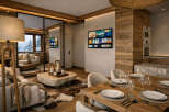 Experience luxury living in this stunning property, featuring a modern interior design with a cozy, rustic touch.