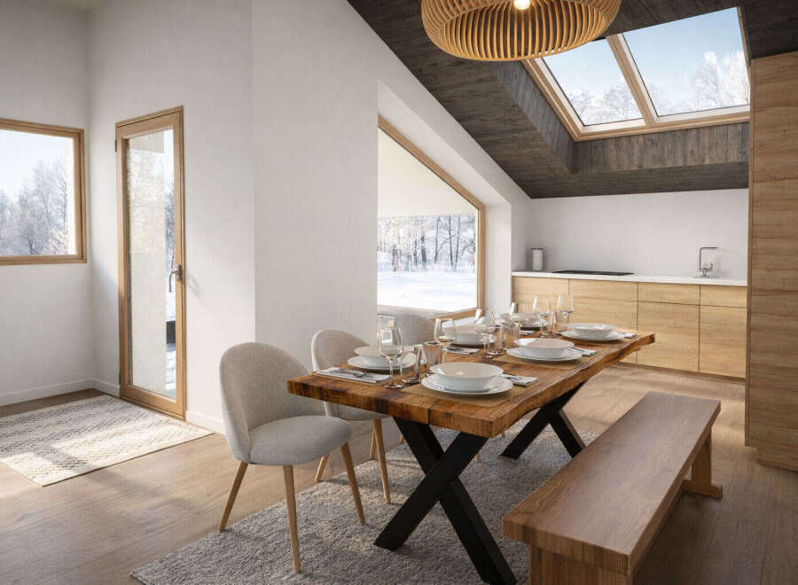 This stunning property features a modern dining area with a rustic wooden table and comfortable seating, perfect for hosting gatherings.