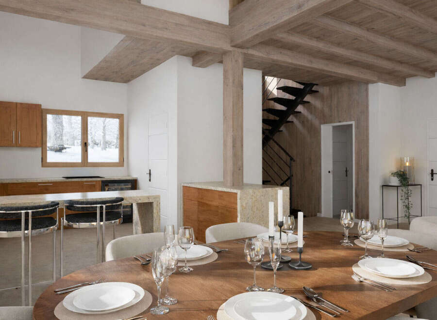 Experience luxury living in this stunning property featuring a spacious kitchen and dining area.