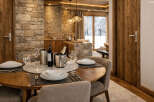 Experience luxury living in this stunning property, featuring a beautifully designed dining area.
