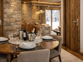 Experience luxury living in this stunning property, featuring a beautifully designed dining area.