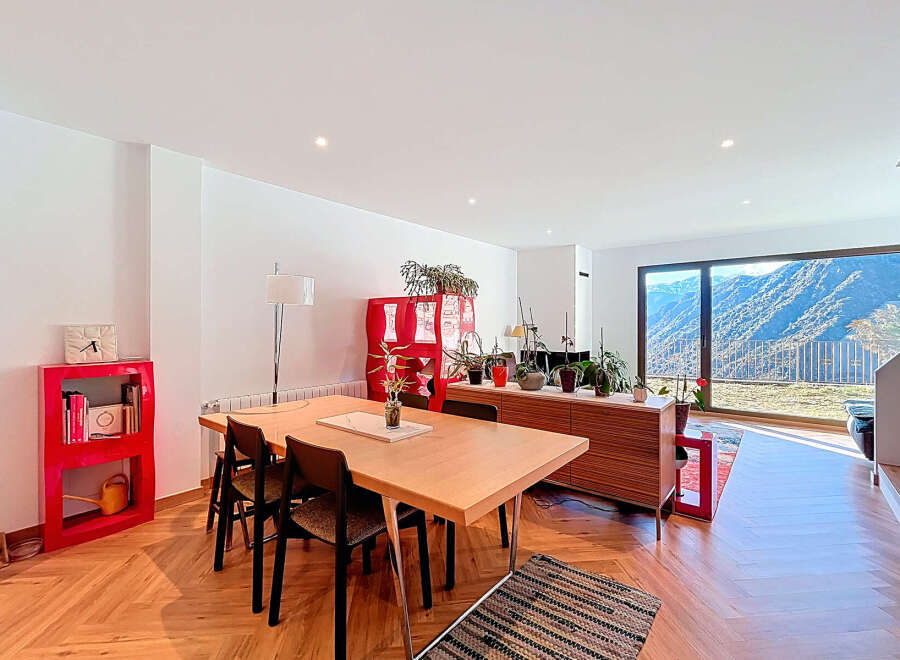 This stunning property boasts a modern interior with a bright and airy living space.