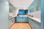 Step into this stunning kitchen, a perfect blend of style and functionality.