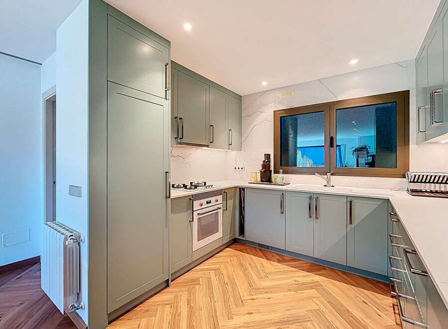 This stunning kitchen boasts modern design and functionality.