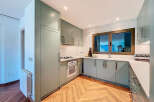 This stunning kitchen boasts modern design and functionality.