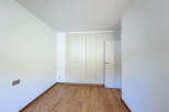 Discover the elegance of this modern space, featuring a built-in closet for ample storage.