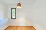This bright and airy room features a modern design with clean lines and a minimalist aesthetic.