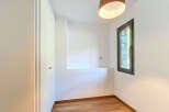 This bright and airy room features a modern design with clean lines and a neutral color palette.