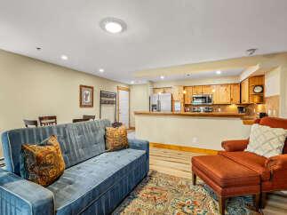 Step into this inviting living space, perfect for relaxation and entertaining.