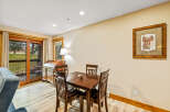This charming dining area features a warm, inviting atmosphere, perfect for enjoying meals with loved ones.