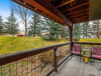 Enjoy the serene views from this charming porch, perfect for relaxing and taking in the natural beauty.