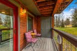 Enjoy the tranquility of this charming cabin's porch, perfect for morning coffee or evening relaxation.