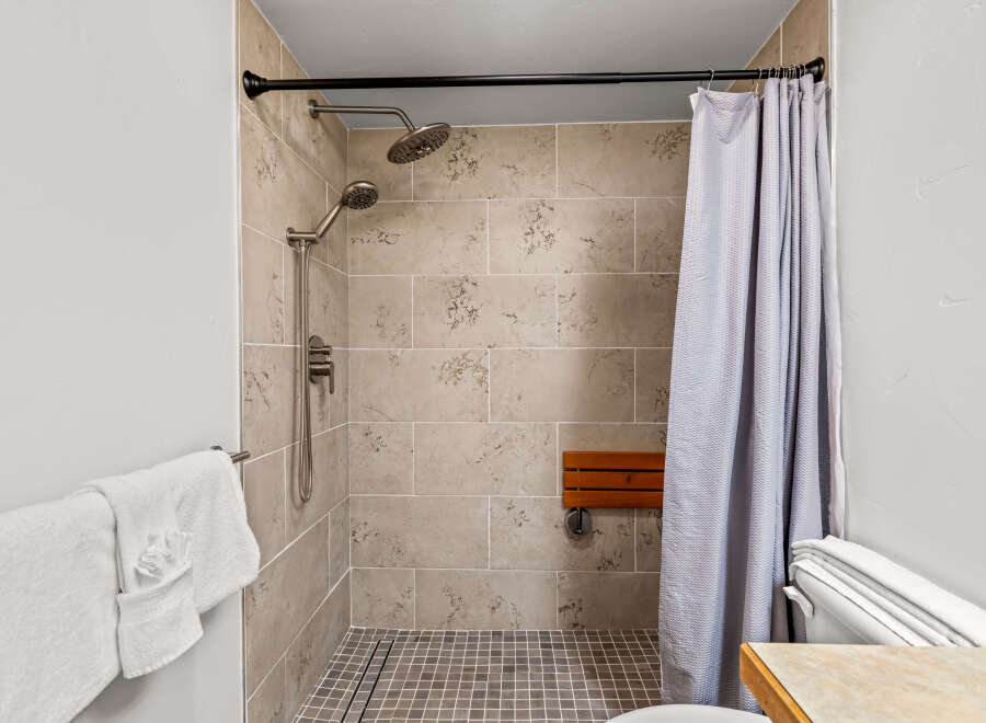 Step into a spa-like oasis with this beautifully designed bathroom.