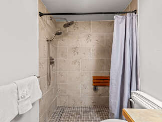 Step into a spa-like oasis with this beautifully designed bathroom.