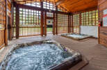 Relax and unwind in this luxurious spa retreat! Featuring two inviting hot tubs, this property offers the perfect setting for relaxation and rejuvenation.