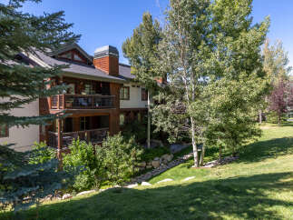 Experience luxury mountain living in this stunning property featuring multiple balconies with scenic views.